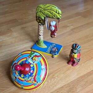 Vintage early 50s Tin Toy Set with monkey Indian and Spinning Top